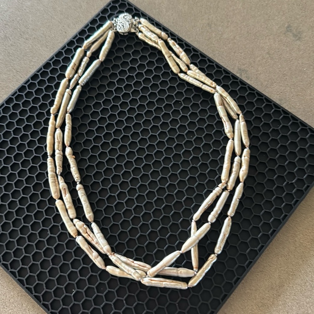Biwa fresh water stick pearl 3 strand necklace.